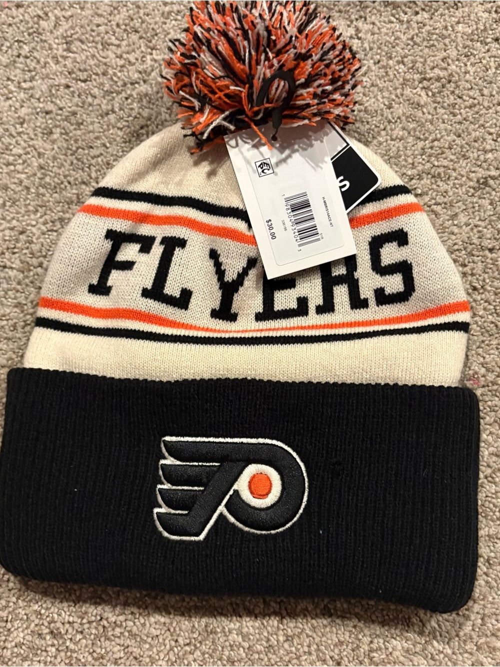 Philadelphia Flyers NHL Fan Favorite Locker Room cuffed knit winter hat